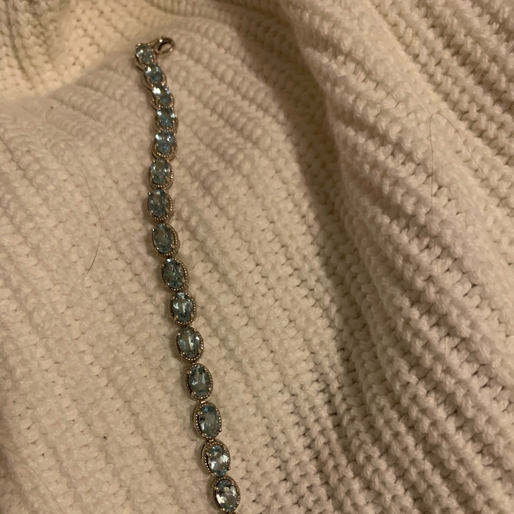 Light blue topaz sterling tennis bracelet